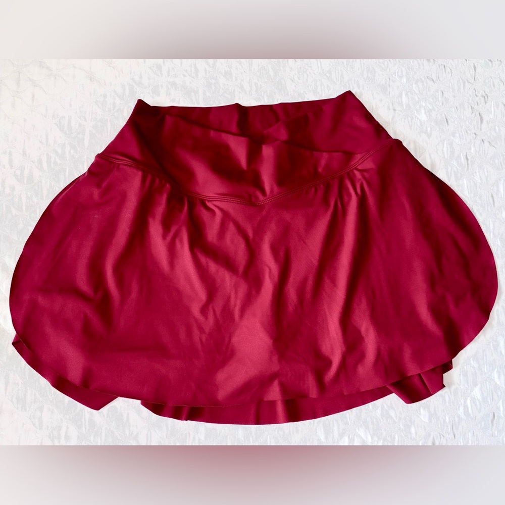 Halara Softly Zero Comfy High Waisted Crossover Side Pocket Flare Tennis Skirt.